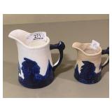 2 Old Sleepy Eye Blue & White Stoneware Creamers