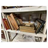 Shelf of Various Picture Frames