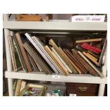 Shelf of Various Picture Frames