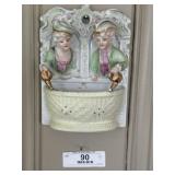 2 Figural Wall Pocket