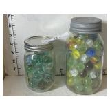 2 Jars of Collectible Marbles