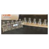 Two Sets of Glass Bottle Vases