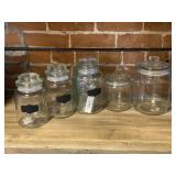 Five Glass Jars with Lids