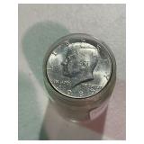 Roll of Uncirculated Kennedy Half Dollars