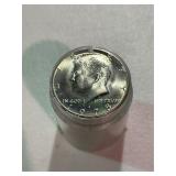 Roll of Uncirculated Kennedy Half Dollars
