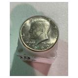 Roll of Uncirculated Kennedy Half Dollars