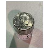 Roll of Uncirculated Kennedy Half Dollars