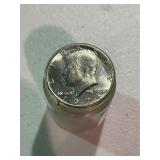 Roll of Uncirculated Kennedy Half Dollars
