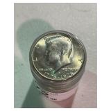 Roll of Uncirculated Kennedy Half Dollars
