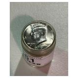 Roll of Uncirculated Kennedy Half Dollars