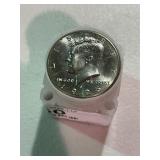Roll of Uncirculated Kennedy Half Dollars