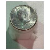 Roll of Uncirculated Kennedy Half Dollars
