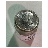 Roll of Uncirculated Kennedy Half Dollars