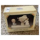 Enesco Precious Moments Figurine