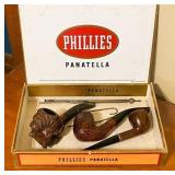 Three Smoking Pipes