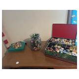 Jar with thread symbols, two metal boxes with