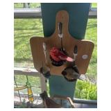 Three Bird nest displayed with spoons and wooden