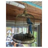 Brass birdhouse with parrot