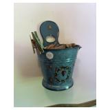 Granite bucket, full of clothes pins