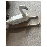 Wooden duck on sled