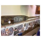 Welcome paddle with key holders