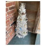 White decorative tree with miscellaneous birds -