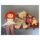 Barbie, Raggedy Ann and a teddy bear