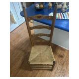 Three ladder back chairs