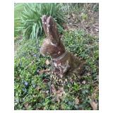 Two concrete decorative garden bunnies