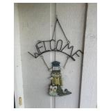 Welcome, sign, and door wreath