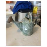 Galvanized Sprinkling can with artificial flowers