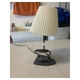Dresser lamp made out of vintage flat iron