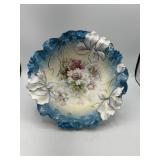 Floral design bowl with brass display