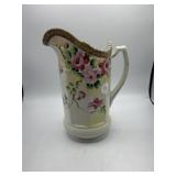 Porcelain pitcher with floral design - Beaded