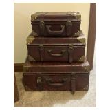 Three vintage nesting suitcases