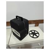 Bell and Howe movie projector and screen