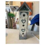 Fancy birdhouse cabinet .  No room for birdies i