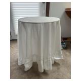Round table with white cover