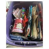 Container full of Christmas Bags and Wrapping Papr