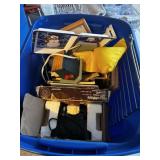 A tote with a Braun hand, mixer, birdhouse
