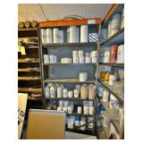 New & Used Tractor Parts with Metal Shelving