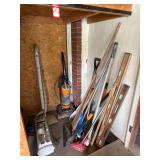 Yard Tools And Two Vacuum Cleaners
