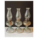 Three Clear Glass Oil Lamps With Chimneys