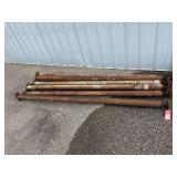 Eight Adjustable Rusted Steel Support Columns