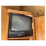 Contents of Cabinet With Electronics And TV