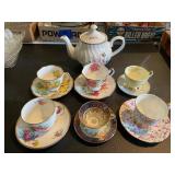 Teapot with 6 - teacups and saucers
