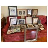 Assorted framed prints and frames