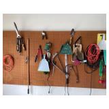 Wall of tools and extension cords