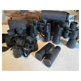 5 - pair of Nikon/Bushnell binoculars