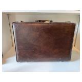 Vintage Presto leather suitcase